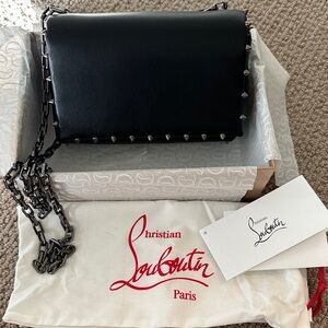 Christian Louboutin black leather bag with red interior
